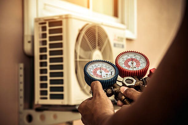 Professional Ac Installation technician working in Raynham, MA